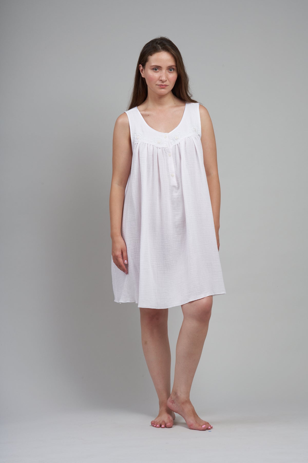 3060 -Short sleeveless gown with yoke